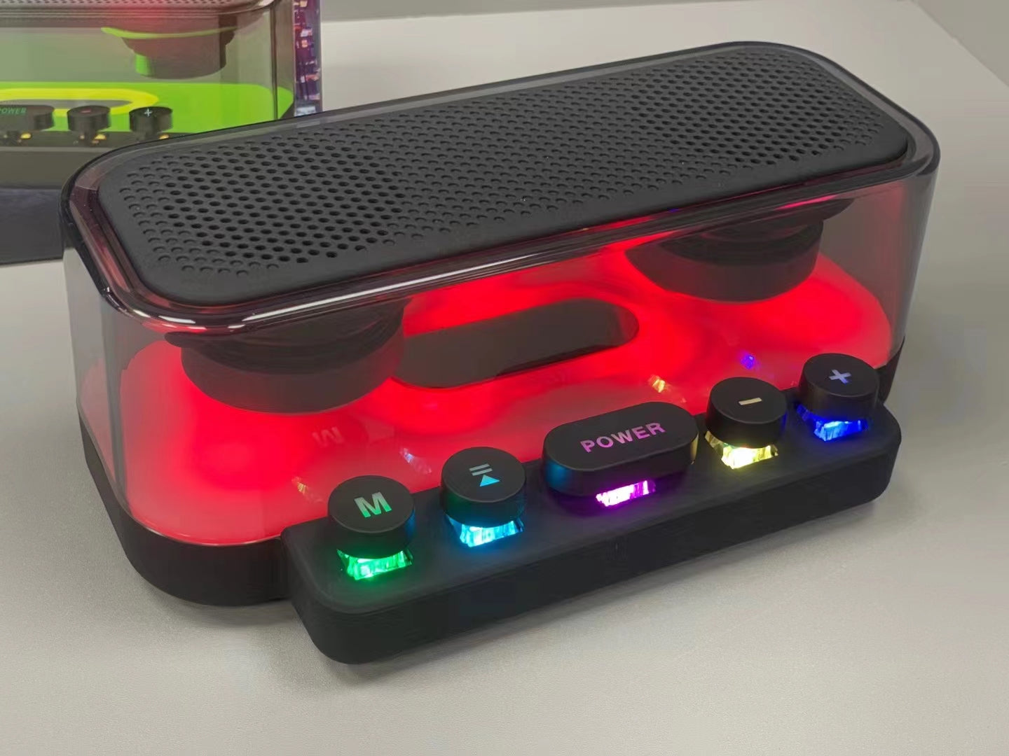 The desktop speaker is transparent and luminous